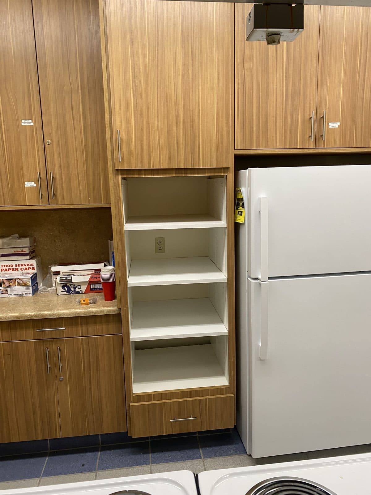 Custom kitchen pantry shelving installed by Dan's Handyman
